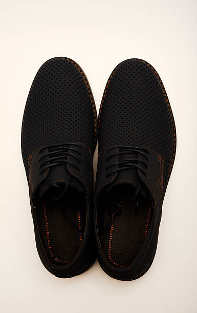 istock Blue leather summer men's boots on a white background. Half-boots with ventilation holes. Light shoes. 2213386949