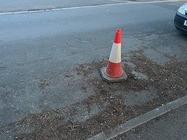 istock Red traffic cone in public road 2213389574