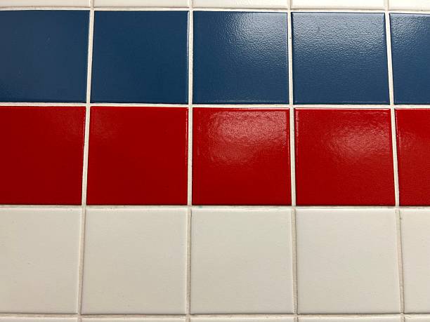 istock Small squared tiled wall, white tiles, red tiles, blue tiles 2213389698