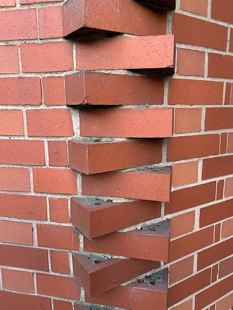 istock Brick corner with red bricks, Bricks spaced apart at edge of corner 2213390134