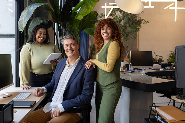 istock Business team smiling in modern coworking space 2213399520