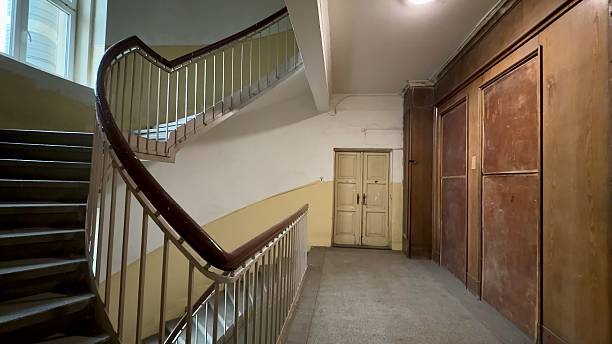 istock Stairs located within a Vintage Building, characterized by its beautifully Decorative Railing 2213410065