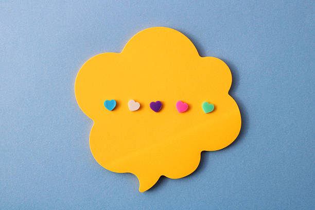 istock Colorful hearts expressing a varied and positive message on a comment bubble 2213412396