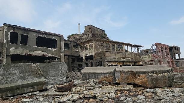 istock Ruins on Gunkanjima with blue sky 2213416500