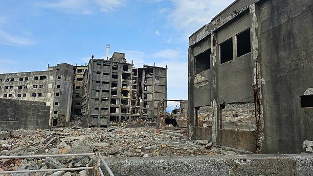 istock Ruins on Gunkanjima with blue sky 2213416521