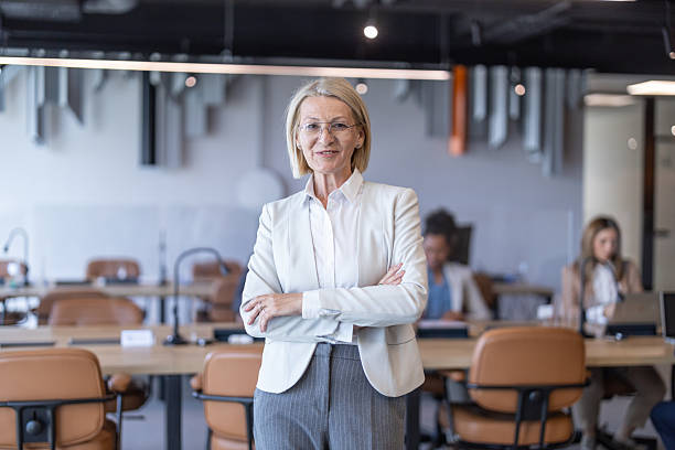 istock Executive woman confidently leading a team meeting 2213421292