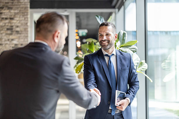 istock Business professional concluding a meeting with a handshake 2213421304