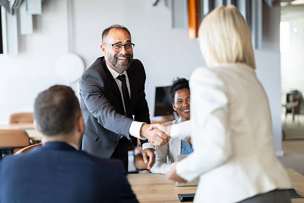 istock Handshake agreement during a business negotiation 2213421323