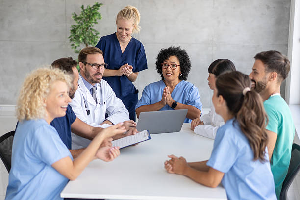 istock Healthcare Workers Engaged in Collaborative Meeting Efforts 2213421496