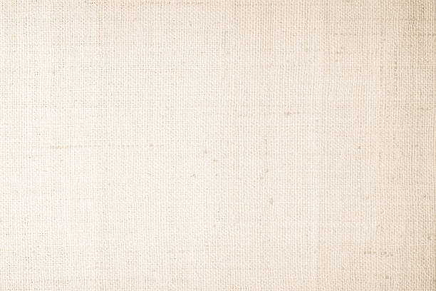 istock Brown sackcloth woven texture background in natural pattern. Jute hessian burlap, linen background in light beige cream color blank. Weaving canvas fiber line cotton cloth textured as organic. 2213421857