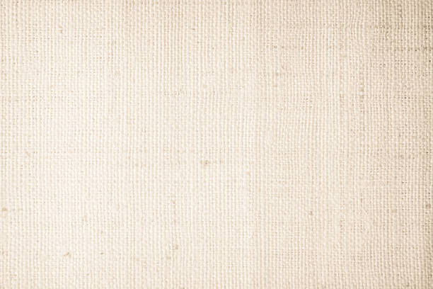 istock Brown sackcloth woven texture background in natural pattern. Jute hessian burlap, linen background in light beige cream color blank. Weaving canvas fiber line cotton cloth textured as organic. 2213421887