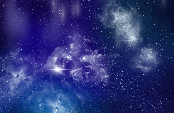 istock Galaxy in the blue clouds floating above the black background atmosphere 2213424196