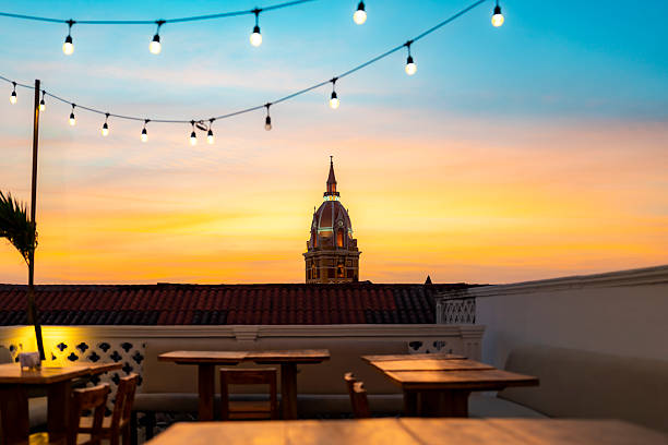 istock Sunset view of Cartagena Cathedral dome from rooftop bar with string lights 2213426336