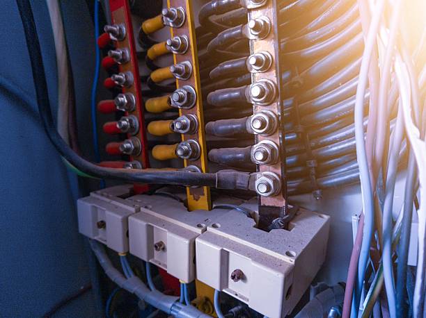 istock Installation of three phase cables connection with copper busbar 2213432394