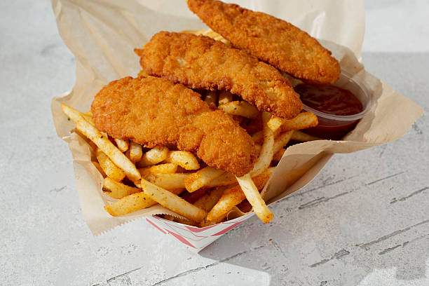 istock chicken tenders, fries 2213434958