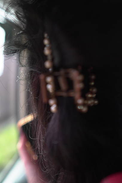 istock Elegant pearl hair claw clip 2213437404