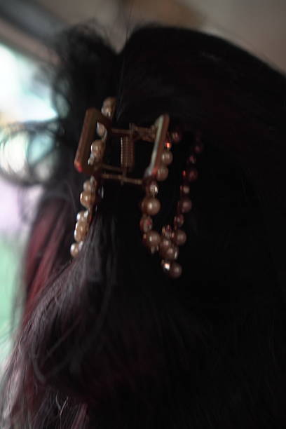 istock Elegant pearl hair claw clip 2213437429