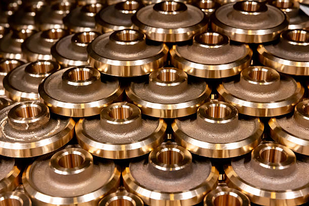Close-up on bronze metal machine parts - metallurgy industry concepts