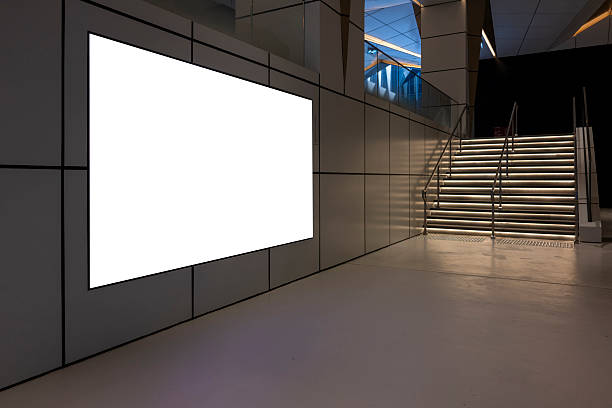 Empty billboards by the stairs in modern indoor spaces