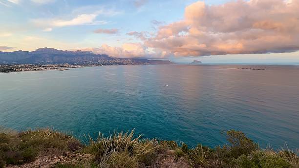 istock A Stunning Coastal View at Sunset with Dramatic and Beautiful Clouds Above the Horizon 2213439847