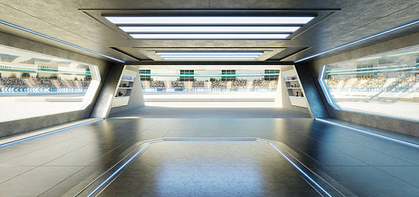 Futuristic garage space overlooking racetrack with spectators, illuminated by neon lights. 3d rendering