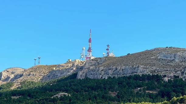 istock Communications Towers Positioned On A Mountain Range, Enhancing Connectivity and Broadcasting 2213440000