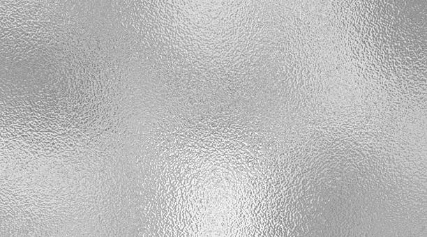 istock gray foil glass texture background. Abstract gradient bright light reflection and shiny rough texture surface 2213442726