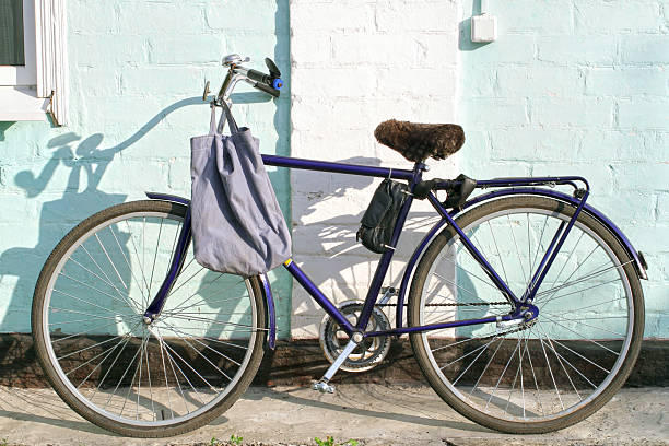 Road bike with a bag on the handlebars. A regular simple bike.