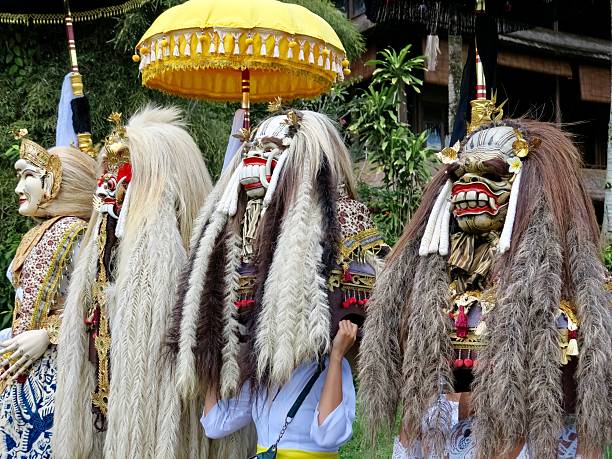 istock Baliense People Wearing Masks in a Ceremony 2213445616