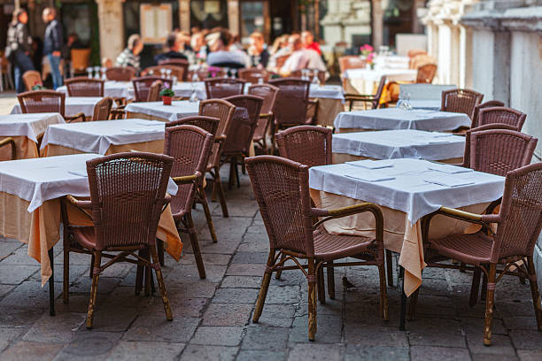 istock cafe tables in venice ready for lunch 2213449118