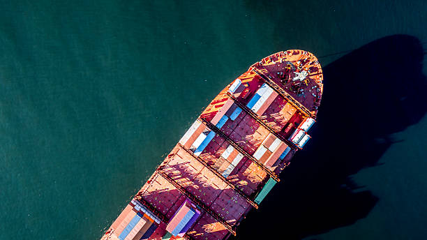 istock Cargo ship with containers aerial view from directly above, with copy space 2213450107