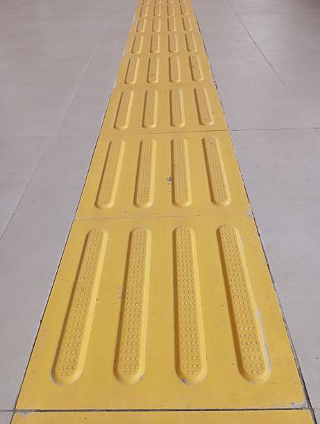 istock Guide blocks, special raised paths for visually impaired people in open spaces 2213450469