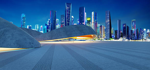 istock 3d rendering Modern parking lot structure illuminating city skyline at dusk 2213450539
