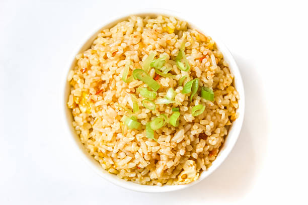 istock a bowl of fried rice isolated on a white background 2213451006