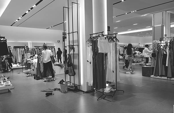 Mannequin Clothing Shop with KRTS and Sweaters on a window in a shopping center