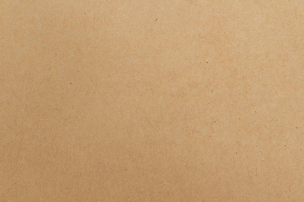 istock Cardboard sheet texture background, pattern of brown kraft paper with vintage style. 2213464734