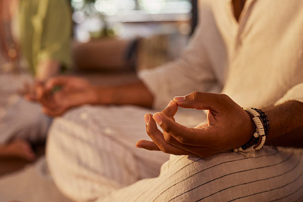 istock Close up of black hands mudra during meditation 2213465629