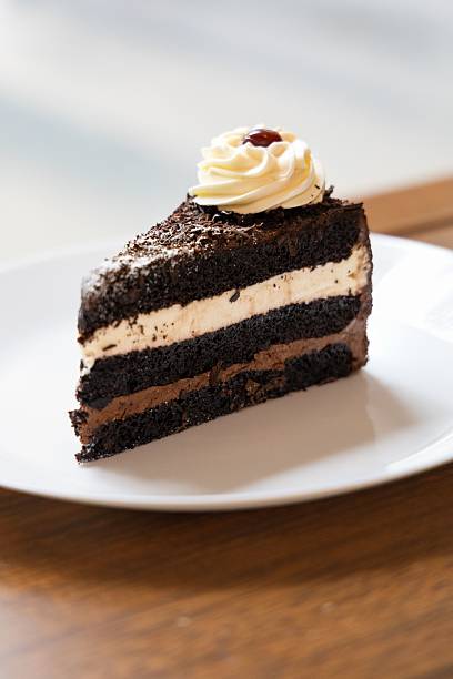 istock Chocolate Cake Slice with Cream and Cherry 2213466857
