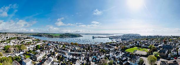istock Coastal town and harbor panorama 2213468379