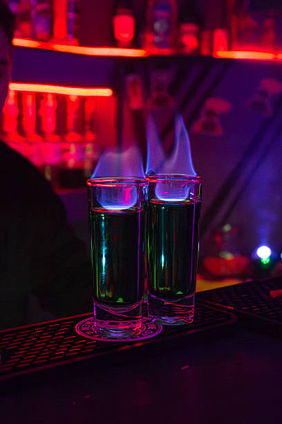 istock Burning absinthe drink in shot glass 2213469949