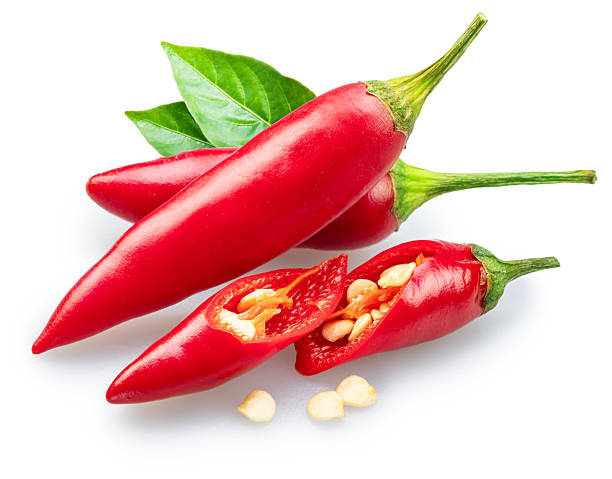 istock Fresh red chilli peppers with green leaves isolated on white background. File contains clipping paths. 2213470285