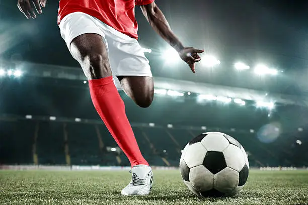 Collage. Dynamic photo of soccer player in red-white uniform moving toward ball during match, ready to score final goal and win. Collage. Dynamic photo of soccer player in red-white uniform moving toward ball during match, ready to score final goal and win.