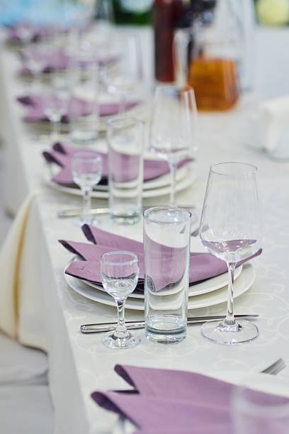 istock Table setting, ready for the reception of guests. Glasses for drinks on the table 2213472464