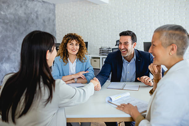 istock Business team celebrating successful project in boardroom 2213472857