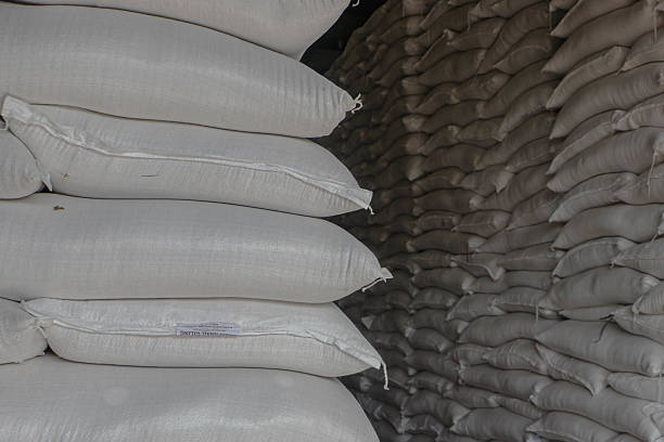 istock Stacks of rice sacks in the warehouse 2213473005