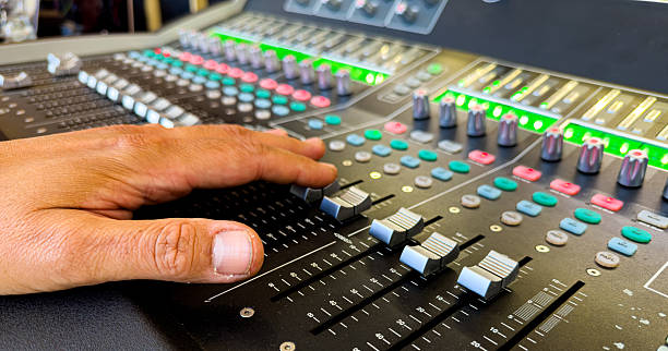 istock Sliders and buttons on Audio Mixing Desk at live event. 2213473230