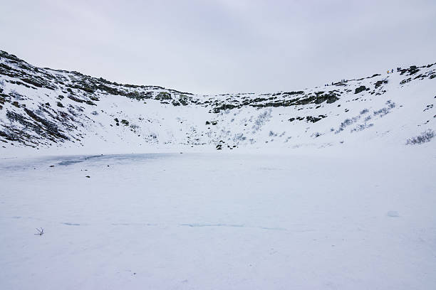 istock Frozen Kerio crater in winter (South Iceland) 2213473970