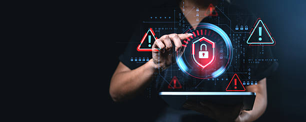 istock Cybersecurity alert concept with padlock and warning icons on digital interface. 2213474052