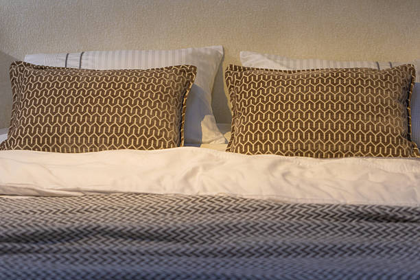 Closeup of cushions on bed for design purpose