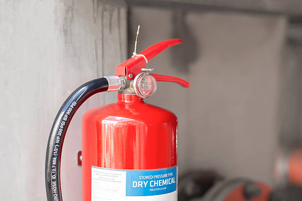 istock fire extinguisher is ready for use in case of an indoor fire emergency. 2213478060
